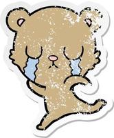 verontruste sticker van een huilende tekenfilmbeer die wegrent vector
