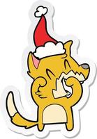 lachende vos sticker cartoon van een dragende kerstmuts vector