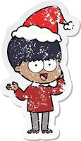 vrolijke, verontruste stickercartoon van een jongen met een kerstmuts vector