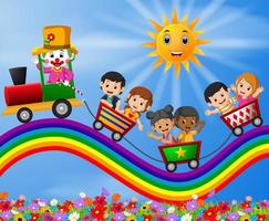 clown en kinderen reizende trein op de regenboog vector