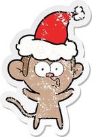 verontruste sticker cartoon van een verraste aap die een kerstmuts draagt vector