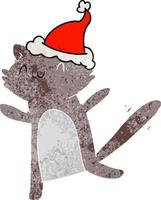 retro cartoon van een dansende kat met een kerstmuts vector