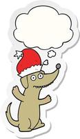schattige kerst cartoon hond en gedachte bel als een gedrukte sticker vector