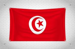 de vlag van tunesië die op bakstenen muur hangt. 3D-tekening. vlag aan de muur. netjes in groepen tekenen op afzonderlijke lagen voor eenvoudige bewerking. vector