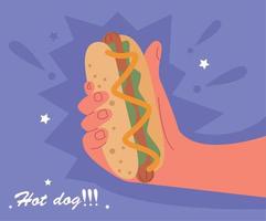 hand met hotdog vector