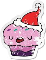 kerst noodlijdende sticker cartoon van kawaii cupcake vector