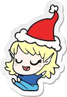 vrolijke stickercartoon van een elfmeisje dat een kerstmuts draagt vector