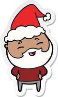 sticker cartoon van een gelukkige bebaarde man met een kerstmuts vector