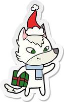 vriendelijk sticker tekenfilm van een Kerstmis wolf vervelend de kerstman hoed vector