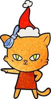 schattig getextureerde tekenfilm van een kat vervelend jurk vervelend de kerstman hoed vector