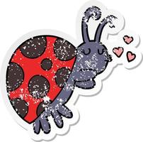 verontruste sticker van een cartoon lieveheersbeestje vector