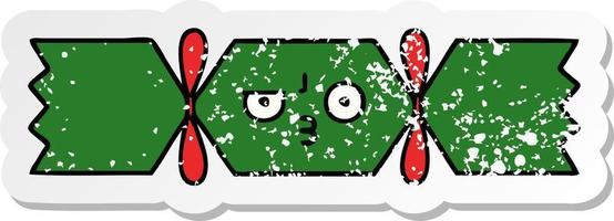 verontruste sticker van een schattige cartoon-kerstkraker vector