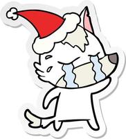 sticker cartoon van een huilende wolf met een kerstmuts vector