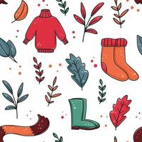 warm gebreid kleren en schoenen naadloos herfst patroon vector