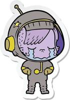 sticker van een cartoon huilend astronautenmeisje vector