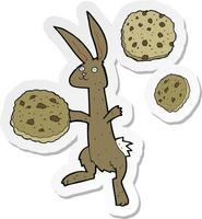sticker van een tekenfilm konijn met koekjes vector