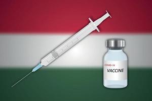 injectiespuit en vaccin flacon Aan vervagen achtergrond met Hongarije vlag vector
