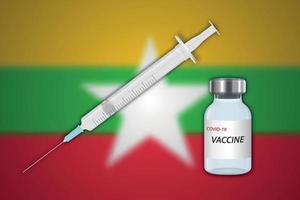 injectiespuit en vaccin flacon Aan vervagen achtergrond met Myanmar vlag vector