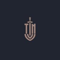 tn logo monogram met zwaard en schild stijl ontwerp sjabloon vector