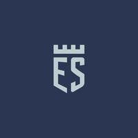 es logo monogram met vesting kasteel en schild stijl ontwerp vector