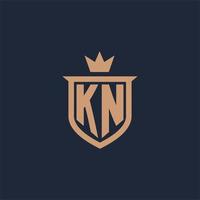 kn monogram eerste logo met schild en kroon stijl vector