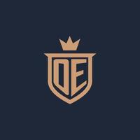 oe monogram eerste logo met schild en kroon stijl vector