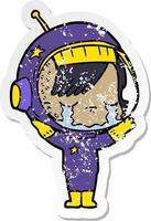 verontruste sticker van een cartoon huilend astronautenmeisje vector