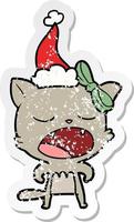 verontruste sticker cartoon van een kat die miauwt met een kerstmuts vector