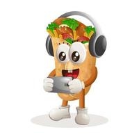 schattig burrito mascotte spelen spel mobiel, vervelend hoofdtelefoons vector