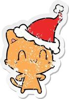 verontruste sticker cartoon van een gelukkige kat met een kerstmuts vector