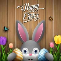 gelukkig Pasen met konijn Holding twee ei kleurrijk Aan houten bruin achtergrond vector