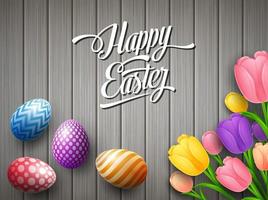 gelukkig Pasen kleurrijk ei met tulpen bloem prachtig bovenstaand houten bruin achtergrond vector