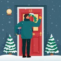 Mens met een geschenk klopt Aan de deur. Kerstmis of nieuw jaar vooravond, besneeuwd het weer. schattig vector illustratie in vlak stijl