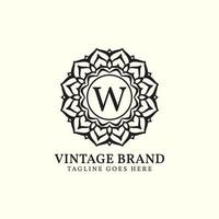 luxueus mandala wijnoogst brief w vector logo ontwerp