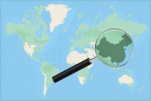 kaart van de wereld met een vergroten glas Aan een kaart van China. vector