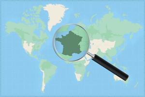 kaart van de wereld met een vergroten glas Aan een kaart van Frankrijk. vector