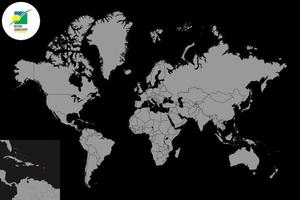 speldkaart met de vlag van Guadeloupe op wereldkaart. vectorillustratie. vector