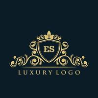 brief es logo met luxe goud schild. elegantie logo vector sjabloon.