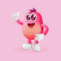 schattig roze monster duimen omhoog vector