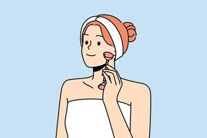 glimlachen jong vrouw in handdoek maken gezicht massage met schoonheid rol. gelukkig meisje Doen gelaats behandeling in badkamer. huidsverzorging concept. vector illustratie.