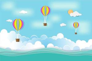 kleurrijke heteluchtballon zwevend over zee vector
