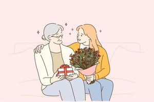 moeders dag vakantie, Dames in familie concept. mooi jong vrouw en haar moeder met bloemen en Cadeau doos zittend en knuffelen Bij huis, gevoel zorg en liefde vector illustratie