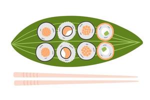 traditioneel Japans sushi en broodjes, en eetstokjes portie Aan groen blad vector