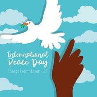 internationale dag van vrede belettering met duif en hand vector