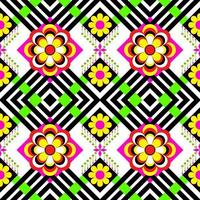 een kleurrijk etnisch naadloos patroon met bloemen ontworpen voor behang, achtergrond, kleding stof, gordijnen, tapijten, kleding, batik, en omhulsel papier in vector formaat.
