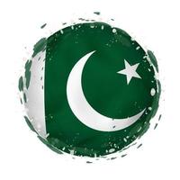 ronde grunge vlag van Pakistan met spatten in vlag kleur. vector