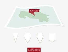 gebogen papier kaart van costa rica met hoofdstad san Jose Aan grijs achtergrond. vier verschillend kaart pin set. vector