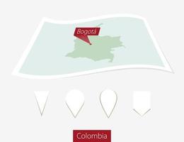 gebogen papier kaart van Colombia met hoofdstad Bogota Aan grijs achtergrond. vier verschillend kaart pin set. vector
