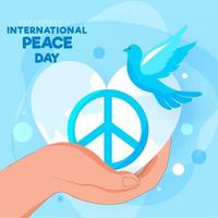 menselijk hand- Holding vrede symbool met duif en hart vorm aarde wereldbol Aan blauw achtergrond voor 21e september, Internationale vrede dag. vector