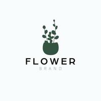 bloem in pot logo ontwerp. tuinieren logo. modern bloem logo sjabloon. vector